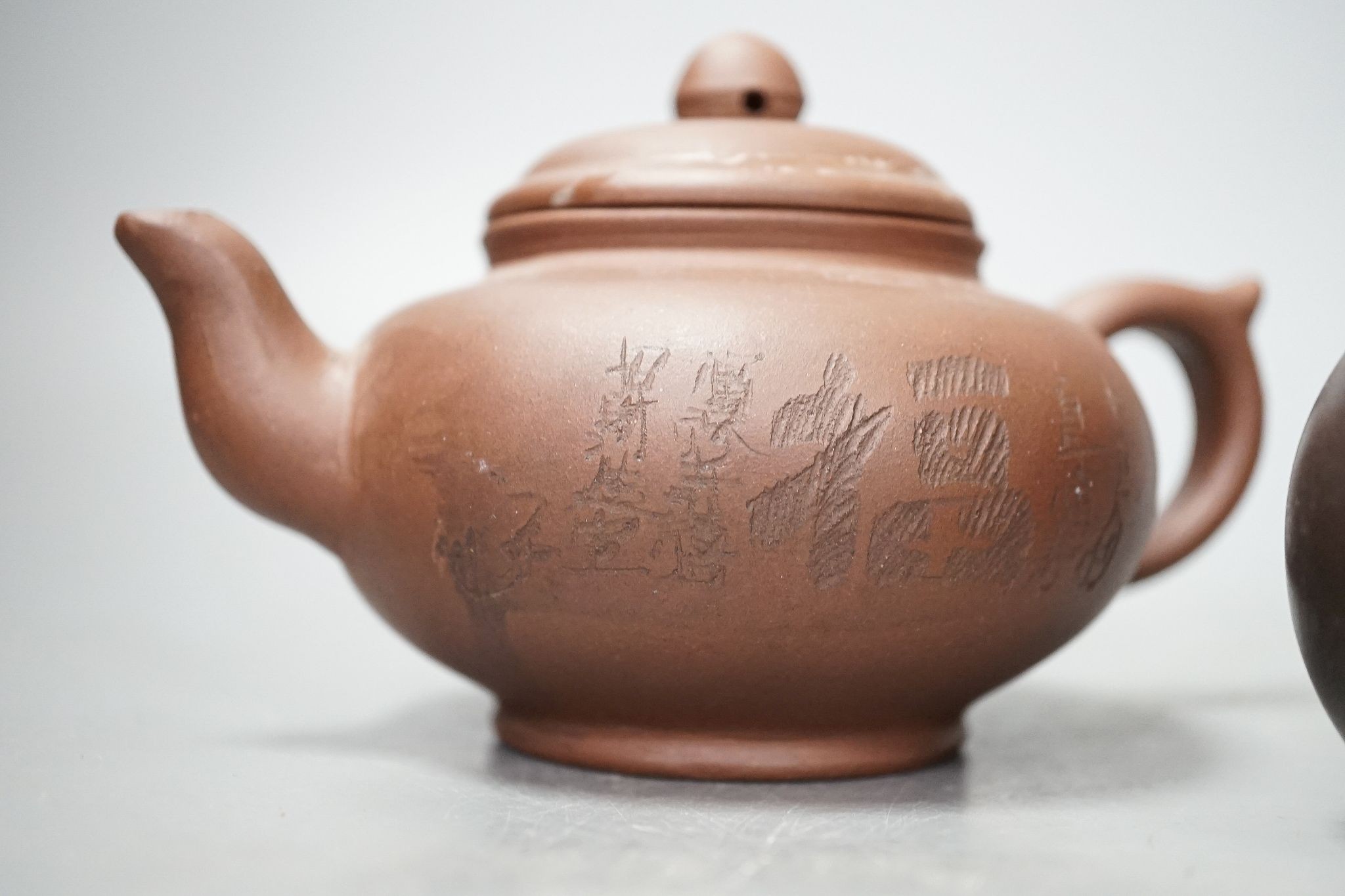 Three Chinese Yixing teapots, tallest 10cm